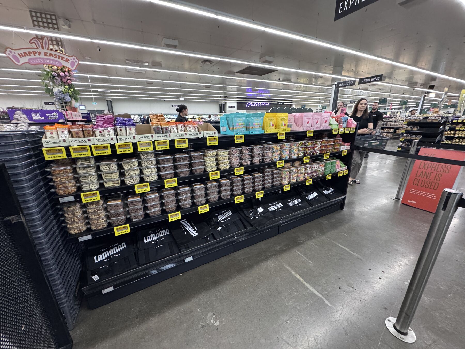 A full bay of Orchard Valley tubs and packets in a supermarket.